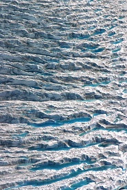 Melt Lakes Forming Among Terrace-Like Structures on the Greenland Ice Sheet